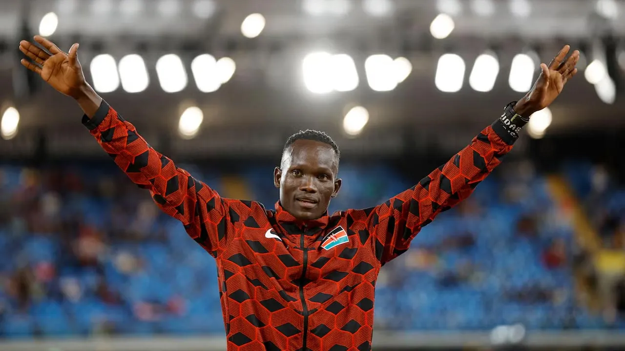 Commonwealth Games - Athletics - Men's 10,000m - Medal Ceremony - Alexander Stadium, Birmingham, Britain - August 2, 2022 Bronze medallist Kenya's Kibiwott Kandie celebrates on the podium REUTERS/John Sibley/File Photo