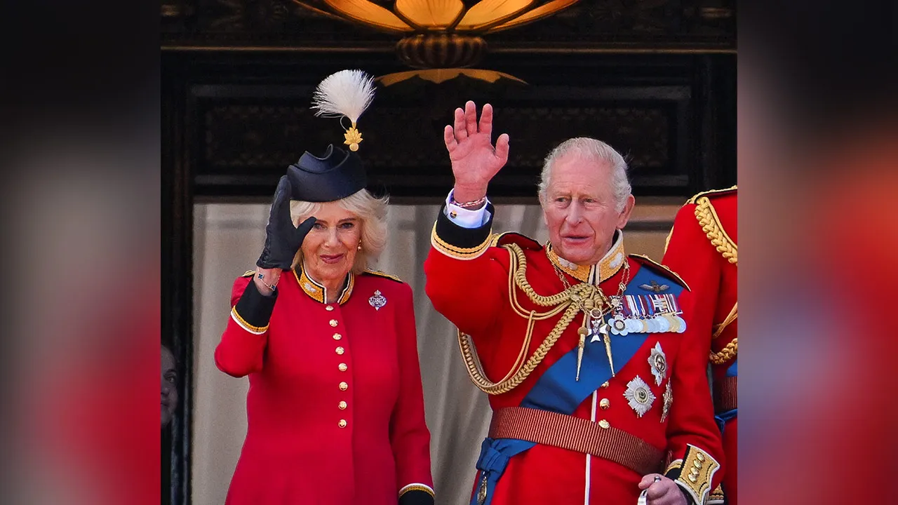Britain's King Charles and Queen Camilla appear on the balcony of Buckingham Palace during the Trooping the Colour parade to honour Britain's King Charles, as part of the official birthday celebrations, in London, Britain, June 13, 2026. REUTERS/Chris J. Ratcliffe