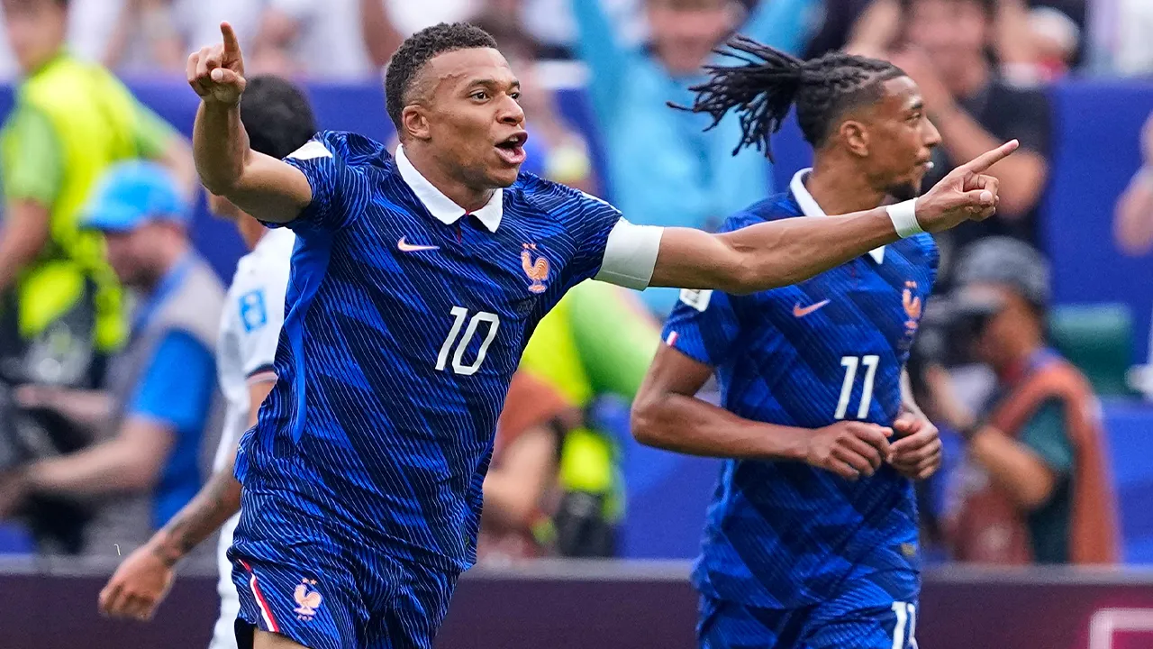 France's Kylian Mbappe (10) celebrates after scoring his team's first goal during the World Cup Group I soccer match between France and Iraq in Philadelphia, Monday, June 22, 2026. (AP Photo/Petr David Josek)