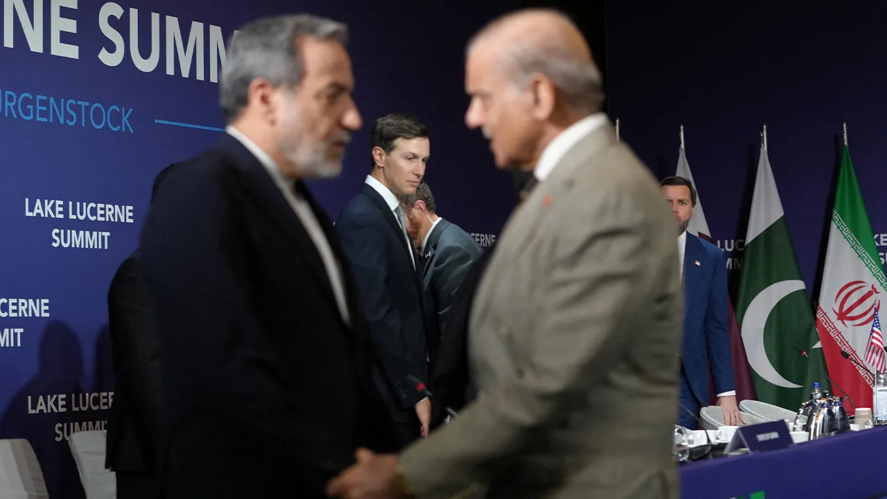 U.S. Vice President JD Vance looks on next to U.S. President Donald Trump's son-in-law Jared Kushner, as Iran's Foreign Minister Abbas Araqchi shakes hands with Pakistan's Prime Minister Shehbaz Sharif, before the start of a quadrilateral meeting between the U.S., Iran, Pakistan, and Qatar at the Lake Lucerne Summit, aimed at advancing a deal to end the Middle East conflict, at Buergenstock Resort Lake Lucerne, near Stansstad, Switzerland, June 21, 2026. REUTERS/Nathan Howard/Pool