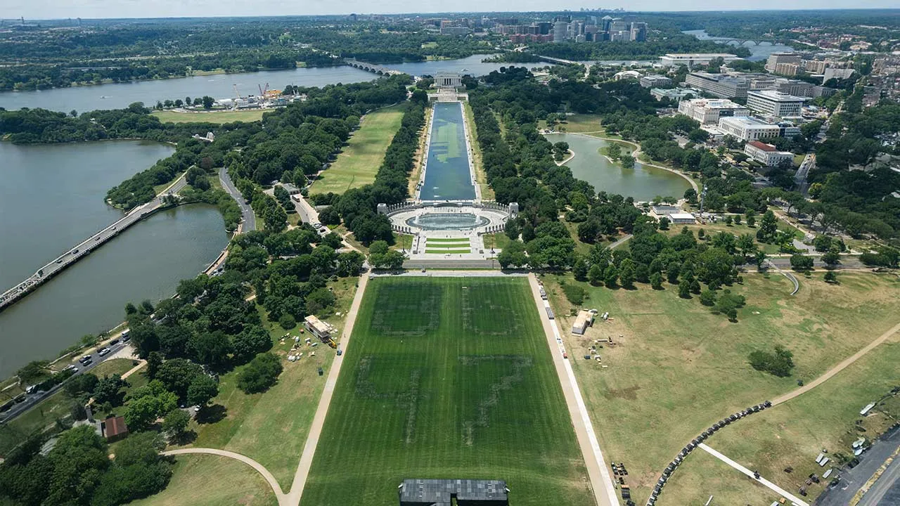 The remnants of markings depicting the numbers 8647 near the Lincoln Memorial Reflecting Pool after recent renovations following a directive from U.S. President Donald Trump to paint it blue ahead of the 250th anniversary of U.S. independence, in Washington, D.C., U.S., June 19, 2026. REUTERS/Aaron Schwartz
