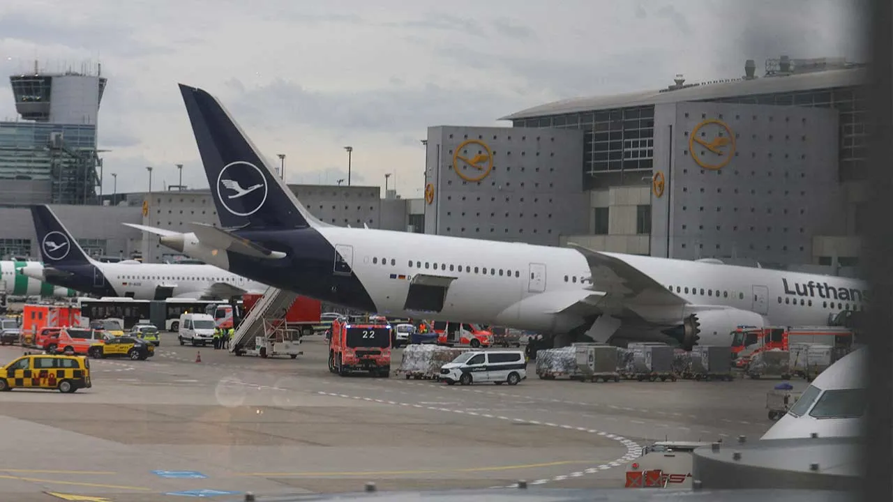 A Lufthansa Boeing is surrounded by ambulances and other emergency vehicles after several staff members were injured when the nose gear of a Boeing 787 jetliner unexpectedly collapsed at a gate at Frankfurt Airport, according to Lufthansa, in Frankfurt, Germany, June 4, 2026. REUTERS/Kai Pfaffenbach