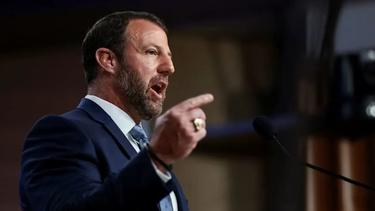 U.S. Secretary of Homeland Security Markwayne Mullin speaks during a press conference hosted with Acting U.S. Attorney General Todd Blanche on unaccompanied minors and prosecuting their sponsors, at the Justice Department, in Washington, D.C., U.S., June 11, 2026. REUTERS/Evelyn Hockstein