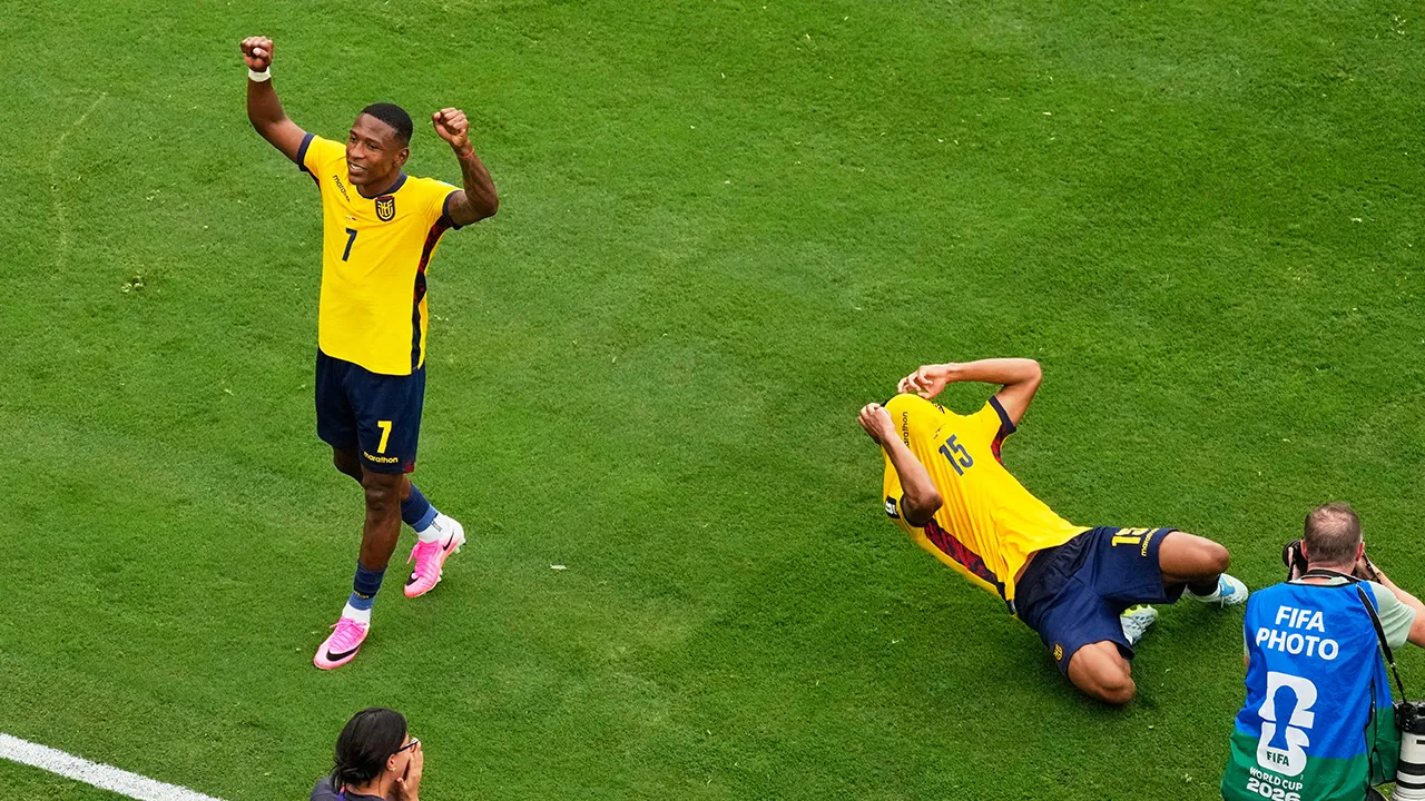 Ecuador's Pervis Estupinan (7) and Pedro Vite (15) celebrate their victory over Germany during the World Cup Group E soccer match in East Rutherford, N.J., near New York, Thursday, June 25, 2026. (AP Photo/Seth Wenig)
