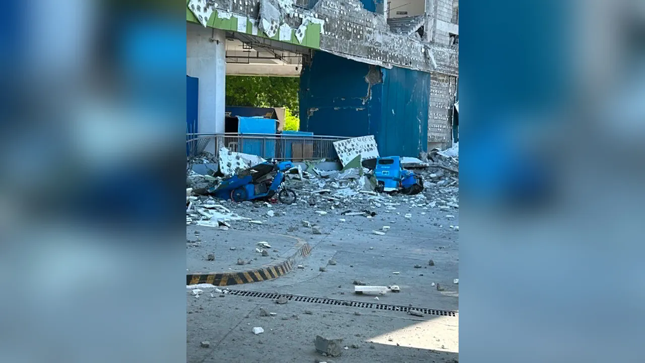 This shows vehicles damaged by debris after powerful earthquake in the Mindanao region, Philippines Monday, June 8, 2026. (Ernesto Torres Jr via AP)