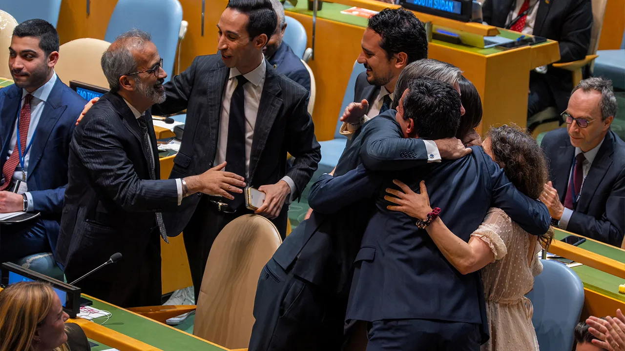 The Portuguese delegation celebrates after winning the election of non-permanent members of the United Nations Security Council at U.N. headquarters in New York City, U.S., June 3, 2026. REUTERS/David 'Dee' Delgado