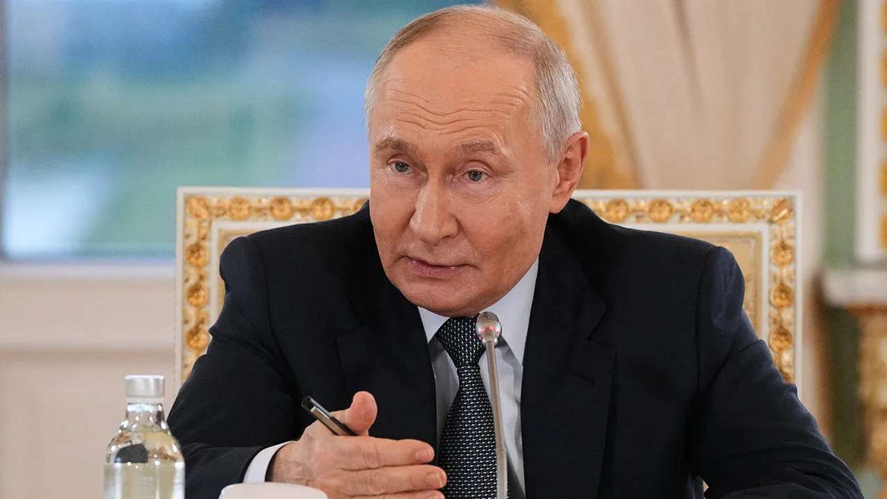 Russian President Vladimir Putin speaks to representatives of international news agencies on the sidelines of the St. Petersburg International Economic Forum, at the Constantine Palace in St. Petersburg, Russia, June 4, 2026. Dmitri Lovetsky/Pool via REUTERS