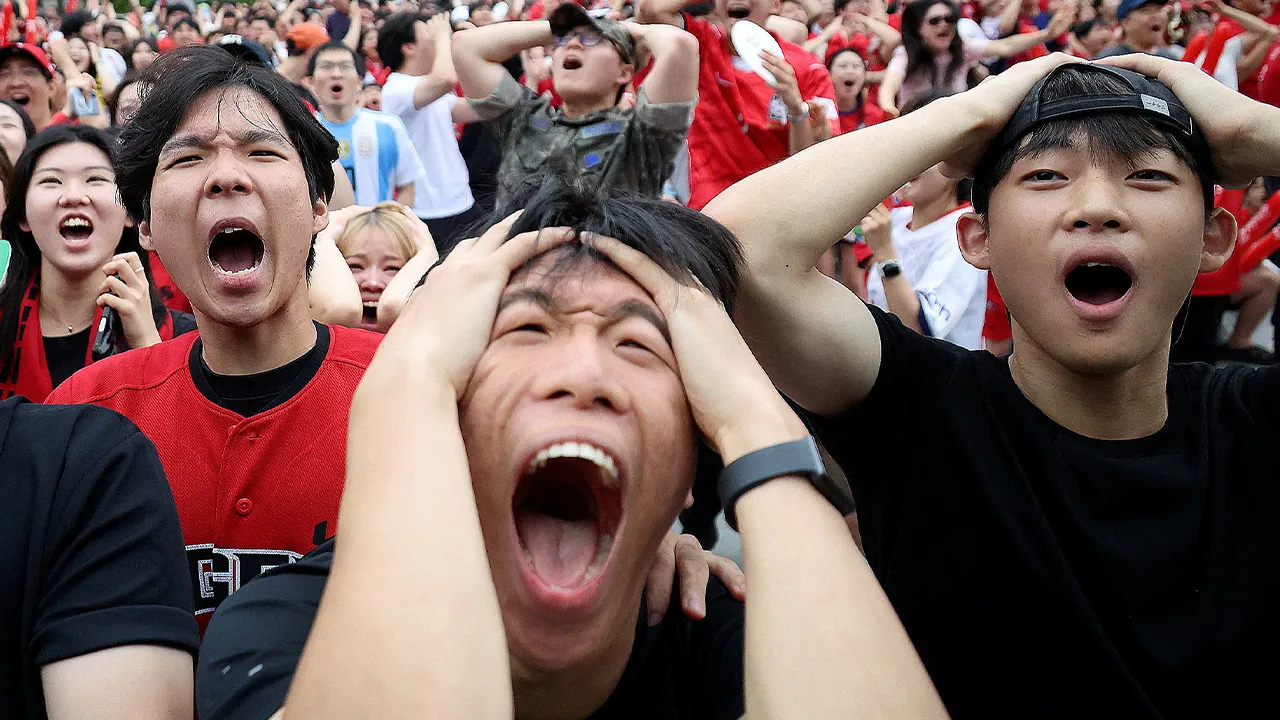 Soccer Football - FIFA World Cup 2026 - Group A - South Africa v South Korea - Fans gather in Seoul - Gwanghwamun Square, Seoul, South Korea - June 24, 2026 South Korea fans react as they watch the match REUTERS/Kim Hong-Ji TPX IMAGES OF THE DAY