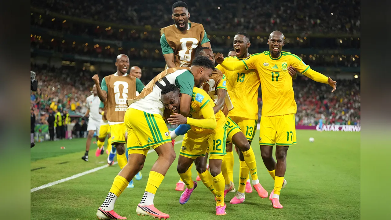 South Africa's Thapelo Maseko (12) celebrates after scoring his side's first goal during the World Cup Group A soccer match between South Africa and South Korea in Guadalupe, near Monterrey, Mexico, Wednesday, June 24, 2026. (AP Photo/Moises Castillo)