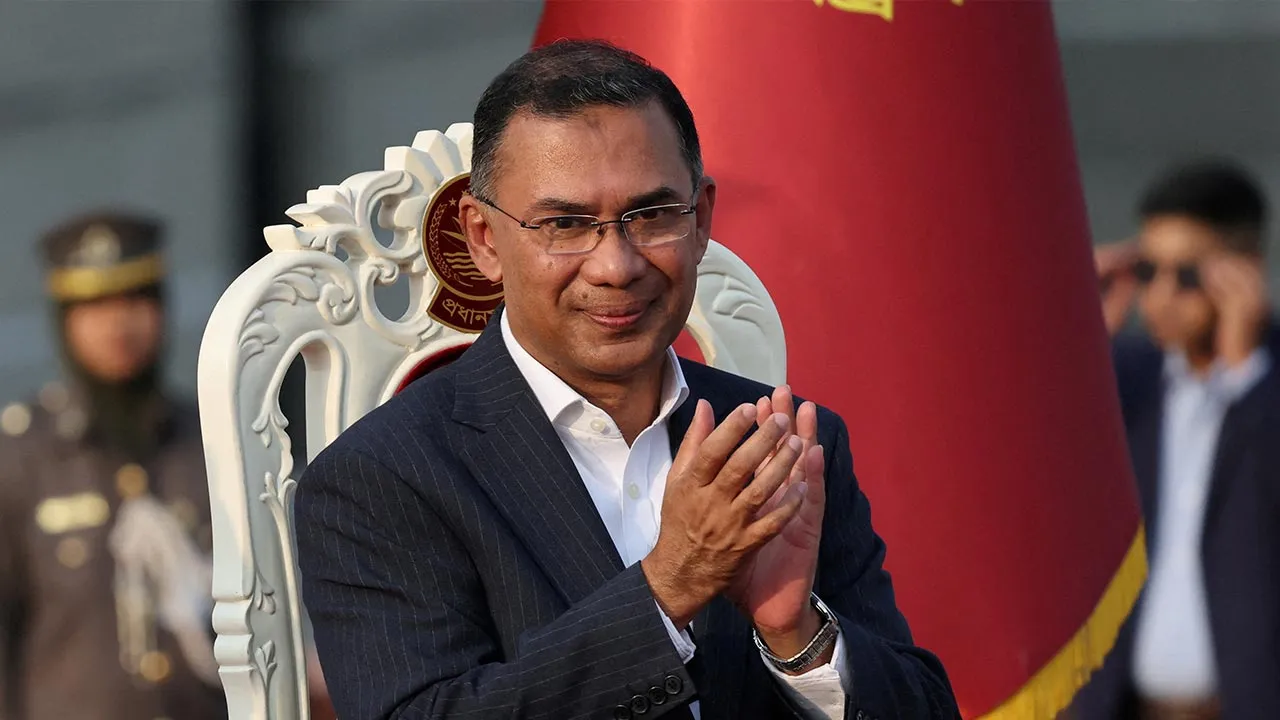 FILE PHOTO: Bangladesh’s newly sworn in Prime Minister Tarique Rahman claps during an oath-taking ceremony at the South Plaza of the parliament building, following BNP's landslide victory in the national polls, in Dhaka, Bangladesh, February 17, 2026. REUTERS/Mohammad Ponir Hossain/File Photo