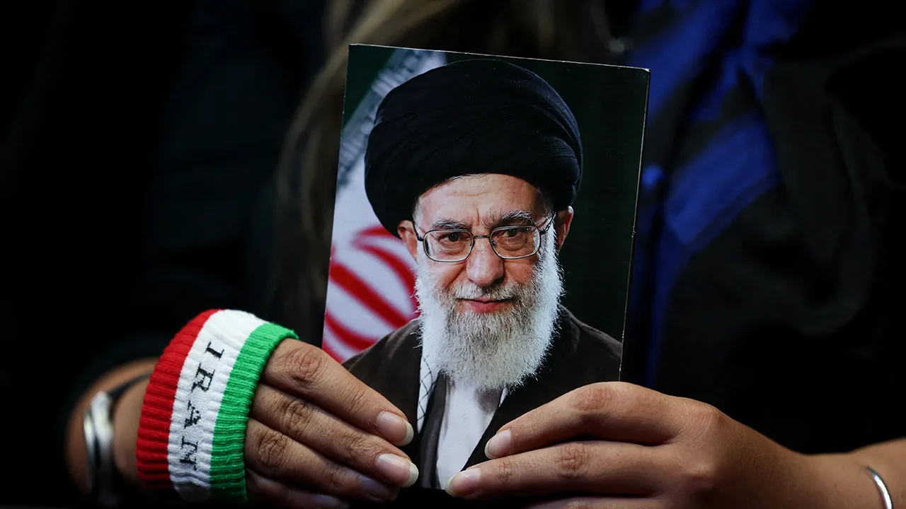 A woman holds an image of late Iranian Supreme Leader Ayatollah Ali Khamenei during a rally in Tehran, Iran, May 29, 2026. Majid Asgaripour/WANA (West Asia News Agency) via REUTERS