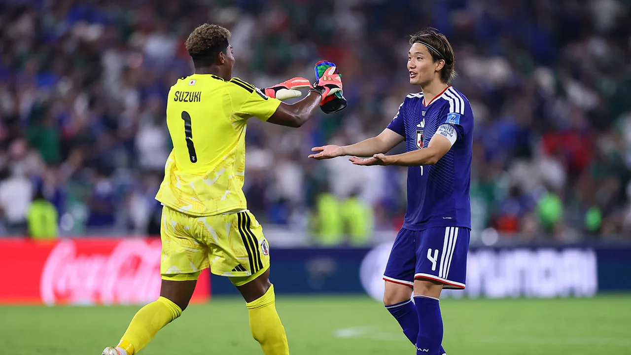 Soccer Football - FIFA World Cup 2026 - Group F - Tunisia v Japan - Estadio Monterrey, Monterrey, Mexico - June 20, 2026 Japan's Zion Suzuki celebrates with Kou Itakura after the match REUTERS/Eloisa Sanchez