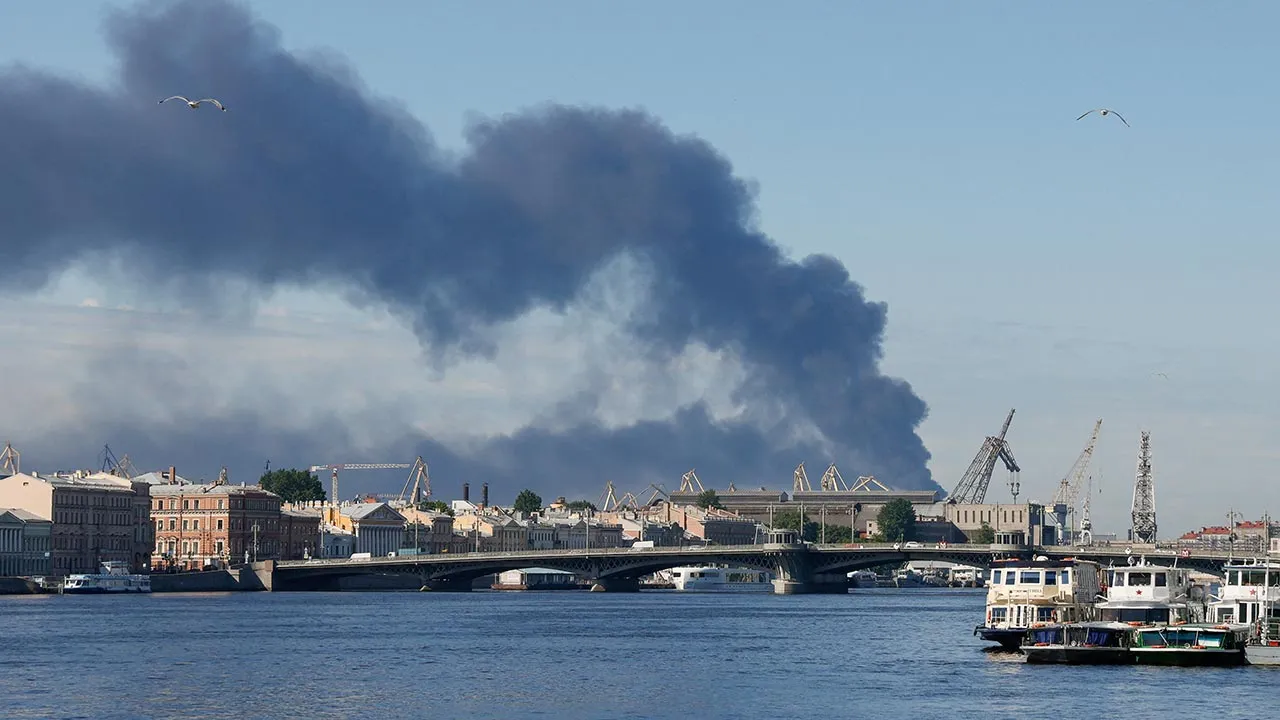 Heavy smoke billows after Ukrainian drones hit infrastructure, according to local authorities, in St Petersburg, Russia June 3, 2026. REUTERS/Stringer