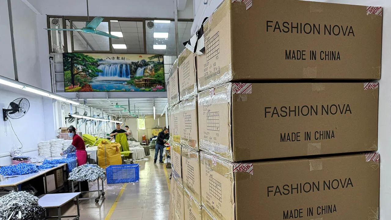 FILE PHOTO: Boxes of clothing for export are pictured at a clothing factory in Guangzhou, Guangdong province, China April 1, 2025. REUTERS/Sophie Yu/File Photo