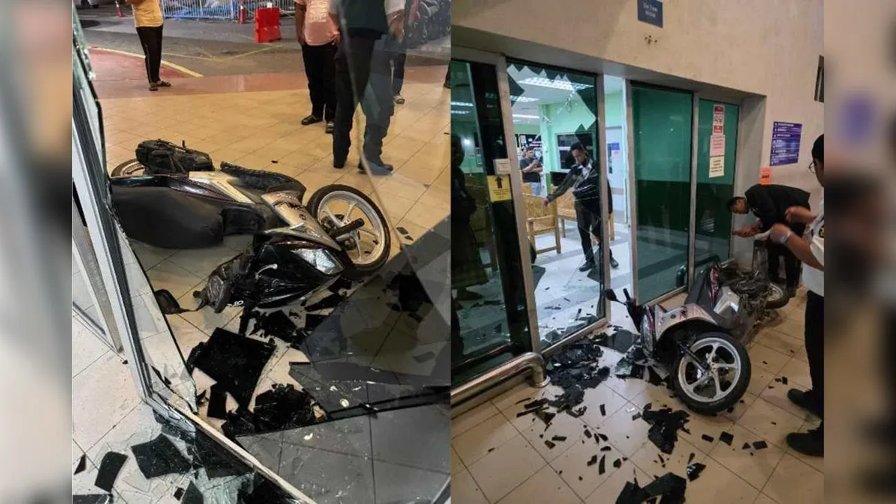 Keadaan pintu kaca Zon Kecemasan HSNZ yang pecah selepas dirempuh sebuah motosikal dalam kejadian awal pagi Selasa._Sinar Harian