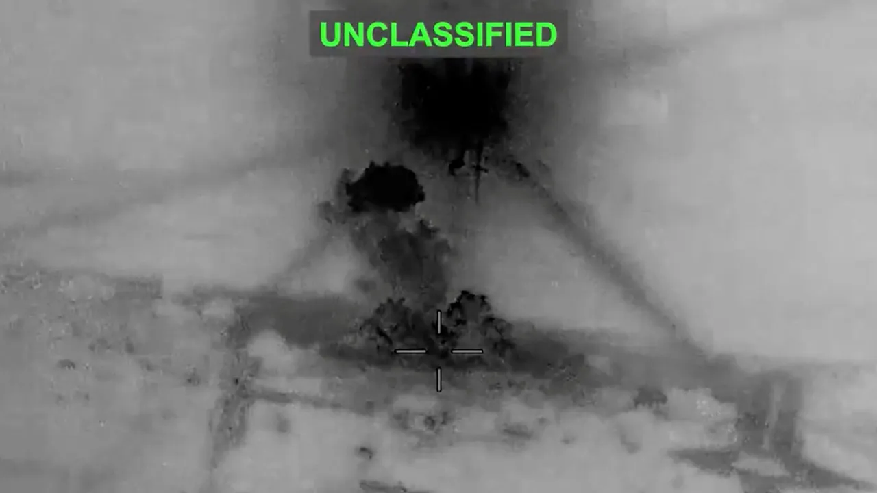 Smoke rises from explosions at an unknown location, following what U.S. Central Command (CENTCOM) said were strikes on Iran in response to an Iranian drone strike on a cargo ship in the Strait of Hormuz, in this screen grab from video released June 26, 2026. U.S. Central Command/Handout via REUTERS THIS IMAGE HAS BEEN SUPPLIED BY A THIRD PARTY. MANDATORY CREDIT. OVERLAY FROM SOURCE. VERIFICATION - Location and date could not be verified. - No earlier version of the video found posted online before Friday (J