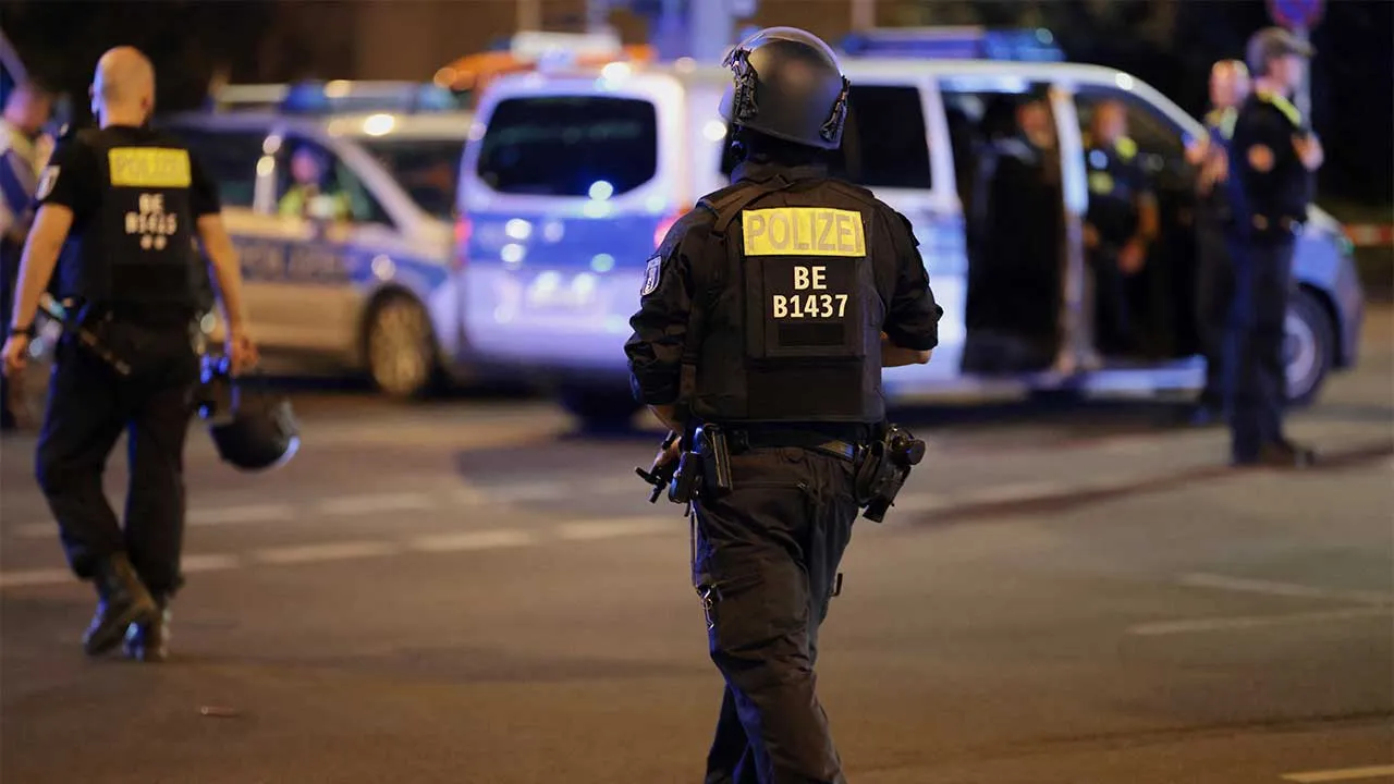 Police officers operate after the annual Berlin's Christopher Street Day Pride parade was called off, after a car crashed into the crowd at Tiergarten park, leaving several people injured, in Berlin, Germany, July 26, 2026. REUTERS/Christian Mang