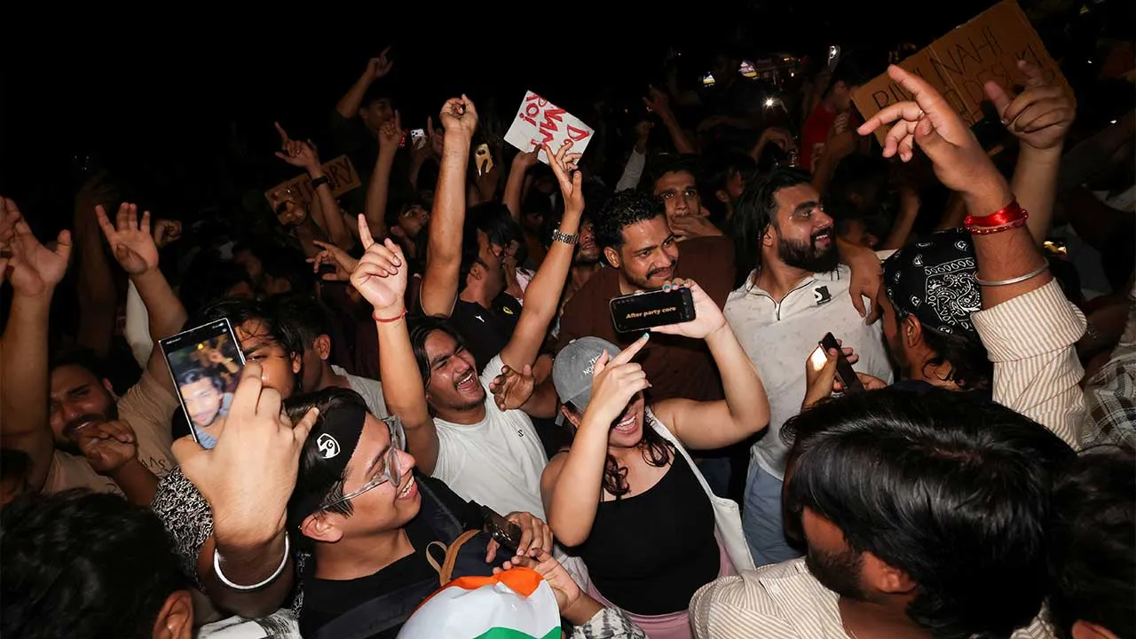 Cockroach Janta Party (CJP) supporters celebrate after the resignation of Education Minister Dharmendra Pradhan over National Eligibility cum Entrance Test (NEET) examination paper leaks, at Jantar Mantar in New Delhi, India, July 25, 2026. REUTERS/Priyanshu Singh