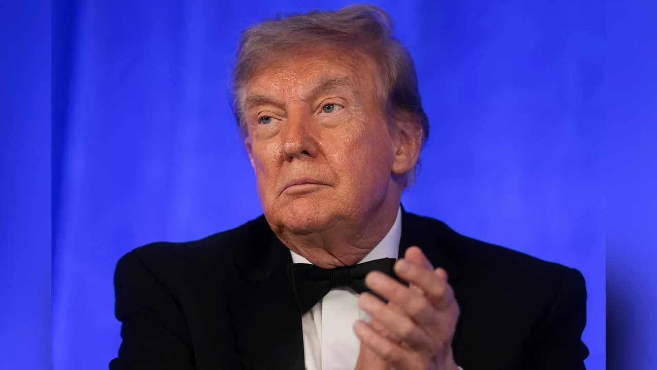 U.S. President Donald Trump reacts at the White House Correspondents' Association (WHCA) Dinner, which was rescheduled from April after it was interrupted when a man tried to force his way through security and fired a shotgun, at the Waldorf Astoria hotel in Washington, D.C., U.S., July 24, 2026. REUTERS/Jonathan Ernst