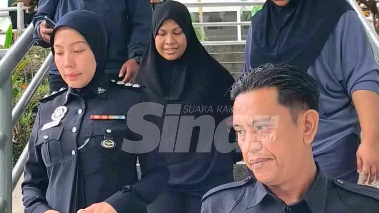 Siti Nur Wahida (tengah) dibawa ke Mahkamah Majistret Shah Alam pada Khamis bagi menghadapi pertuduhan membunuh bayinya yang baru lahir. Foto Sinar Harian