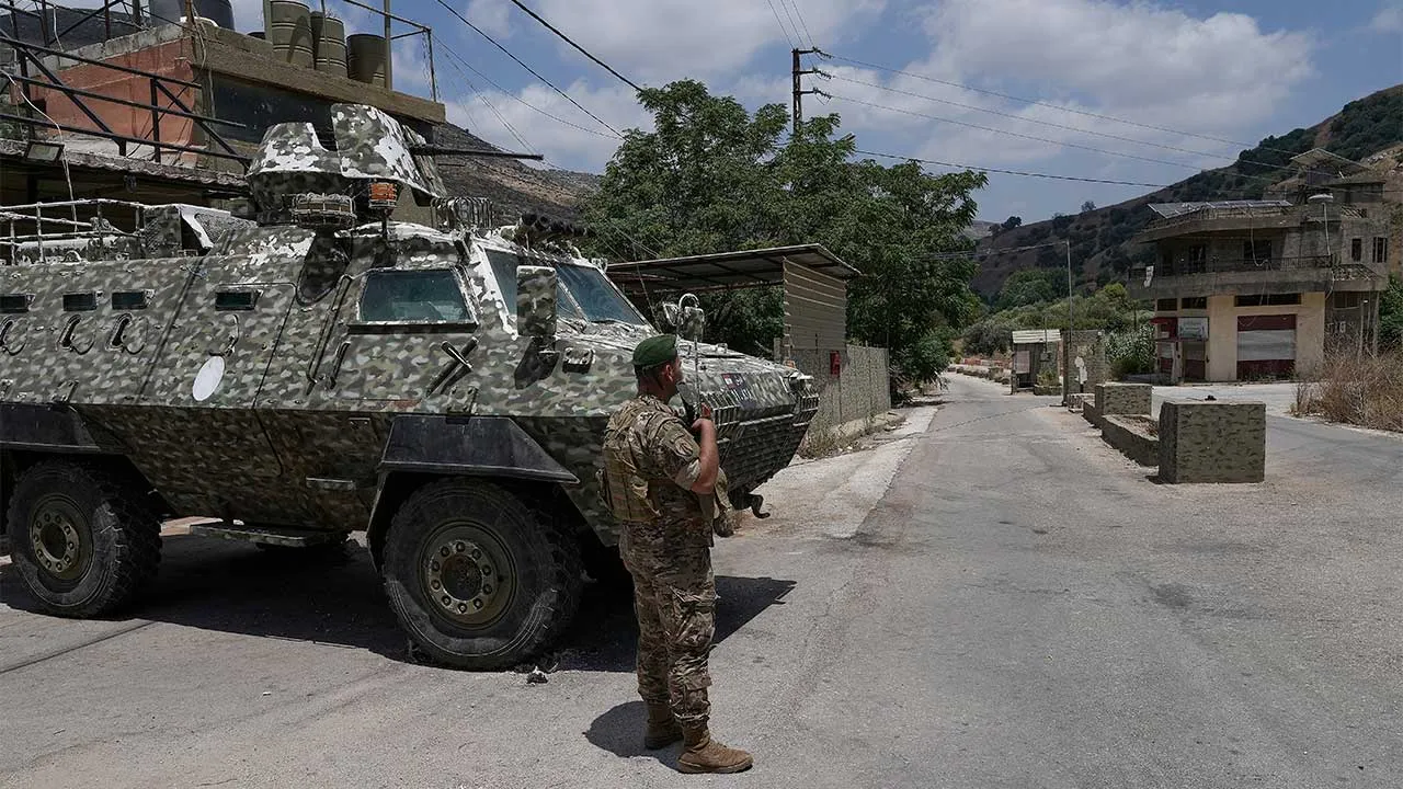 A Lebanese army soldier stands at a checkpoint in Froun village, southern Lebanon, Thursday, July 16, 2026. (AP Photo/Mohammed Zaatari)