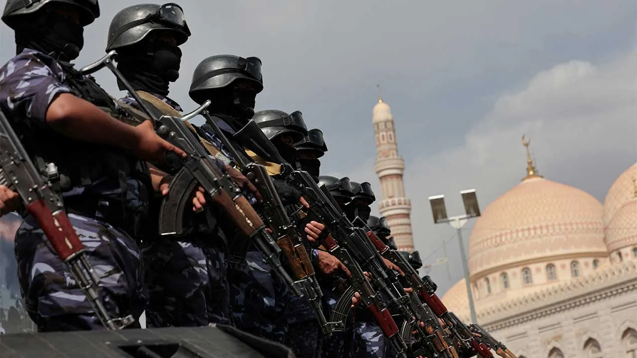 Members of Houthi security force stand guard as Houthi supporters rally against the Saudi-led coalition's restrictions on Houthi-controlled areas, which the group describes as a blockade, in Sanaa, Yemen, July 17, 2026. REUTERS/Khaled Abdullah