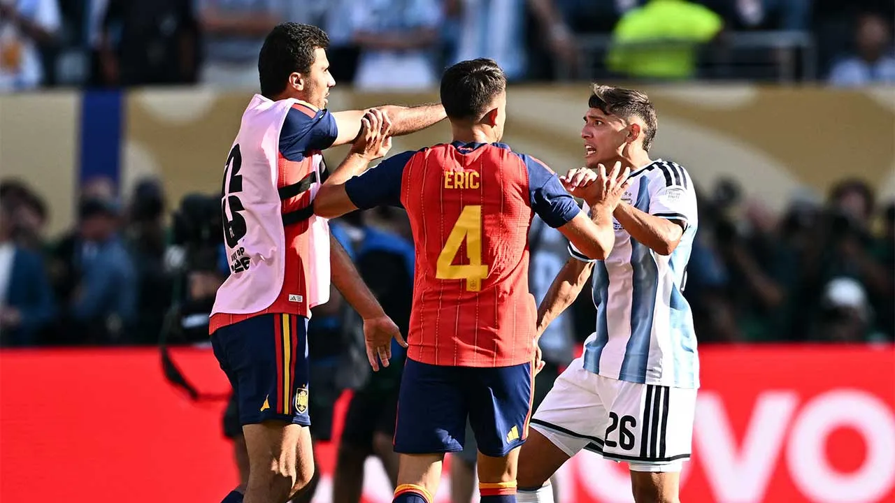 Soccer Football - FIFA World Cup 2026 - Final - Spain v Argentina - New York/New Jersey Stadium, East Rutherford, New Jersey, U.S. - July 19, 2026 Spain's Rodri and Argentina's Nahuel Molina clash after the match REUTERS/Dylan Martinez