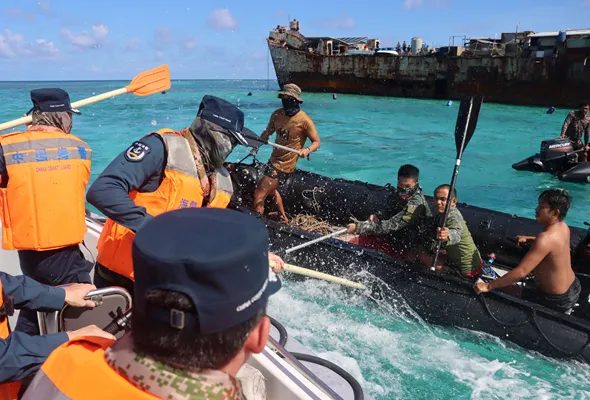 Philippine Navy personnel and China Coast Guard personnel clash near a grounded Philippine warship at Second Thomas Shoal, in the South China Sea, July 20, 2026. cnsphoto via REUTERS ATTENTION EDITORS 