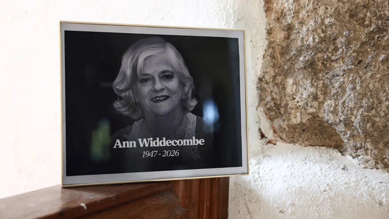  A picture of former government minister and Reform UK member Ann Widdecombe, who was found dead at her home in Haytor on Thursday, is displayed at St. Pancras Church, in Widecombe-in-the-Moor, Britain, July 12, 2026. REUTERS/Jack Taylor/File Photo