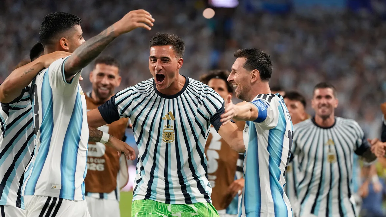 Argentina's Lionel Messi, right, celebrates with Cristian Romero and others after Cape Verde's Diney Borges (3) scored an own goal during the World Cup round of 32 soccer match in Miami Gardens, Fla., Friday, July 3, 2026. (AP Photo/Rebecca Blackwell)