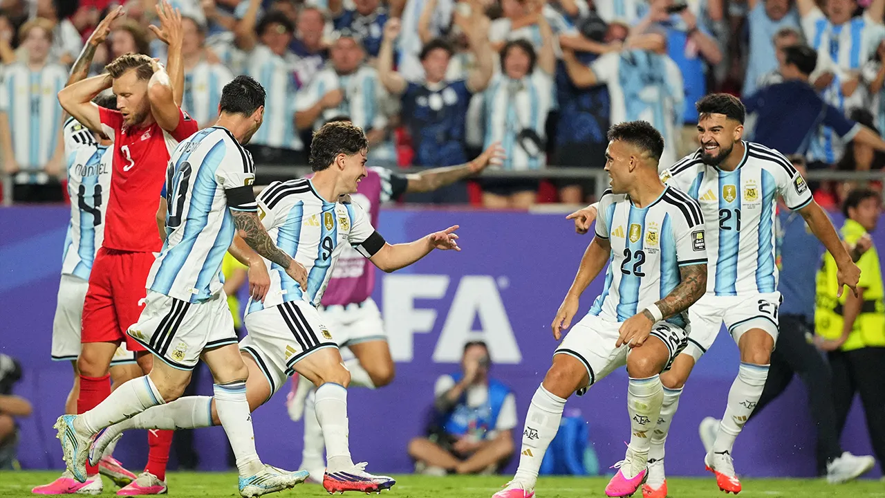 Soccer Football - FIFA World Cup 2026 - Quarter Final - Argentina v Switzerland - Kansas City Stadium, Kansas City, Missouri, U.S. - July 11, 2026 Argentina's Julian Alvarez celebrates scoring their second goal with Lautaro Martinez and Jose Manuel Lopez IMAGN IMAGES via Reuters