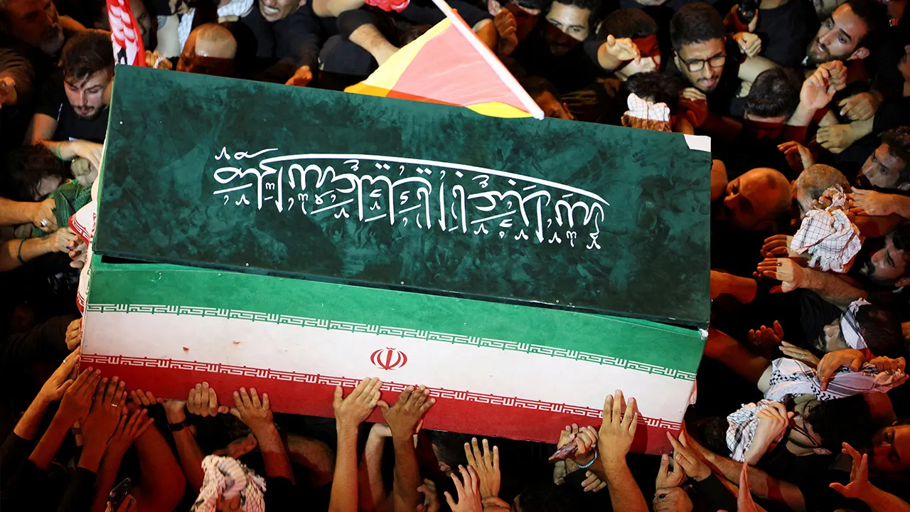 People carry the coffin of Iran's late Supreme Leader Ayatollah Ali Khamenei, who was killed on February 28 in Israeli and U.S. airstrikes, during his funeral procession, in Karbala, Iraq, July 9, 2026. REUTERS/Ahmed Saad 