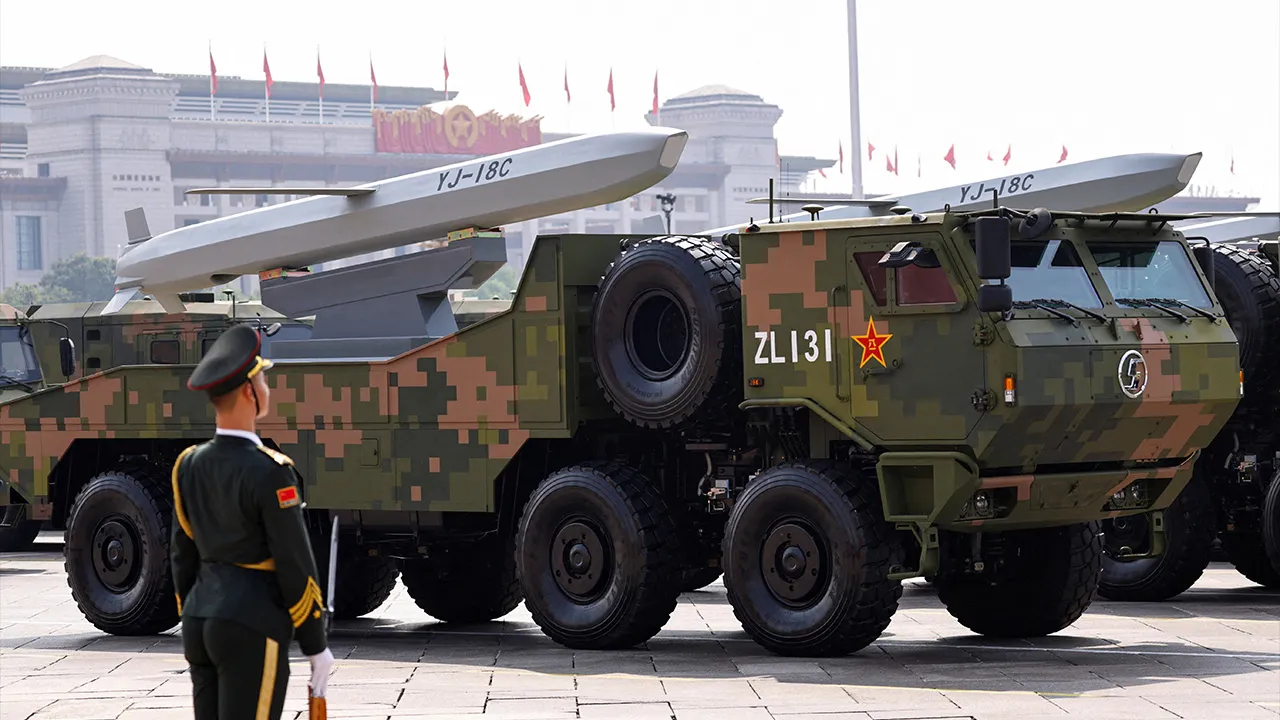 A member of the People's Liberation Army stands as strategic strike group displays YJ-18C cruise missiles during a military parade to mark the 80th anniversary of the end of World War Two, in Beijing, China, September 3, 2025. REUTERS/Tingshu Wang/File Photo