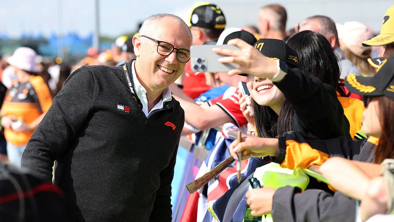 Formula One F1 - British Grand Prix - Silverstone Circuit, Silverstone, Britain - July 3, 2026 F1 CEO Stefano Domenicali poses for a selfie with a fan ahead of practice REUTERS