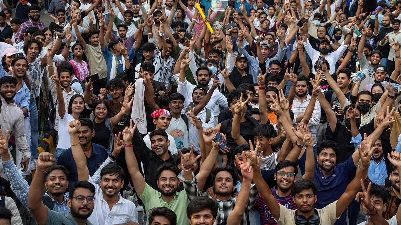 Supporters of India's Cockroach Janta Party (CJP) celebrate after India's Education Minister Dharmendra Pradhan resigned following days of protests demanding his resignation over National Eligibility cum Entrance Test (NEET) examination paper leaks, in New Delhi, India, July 25, 2026. REUTERS/Adnan Abidi