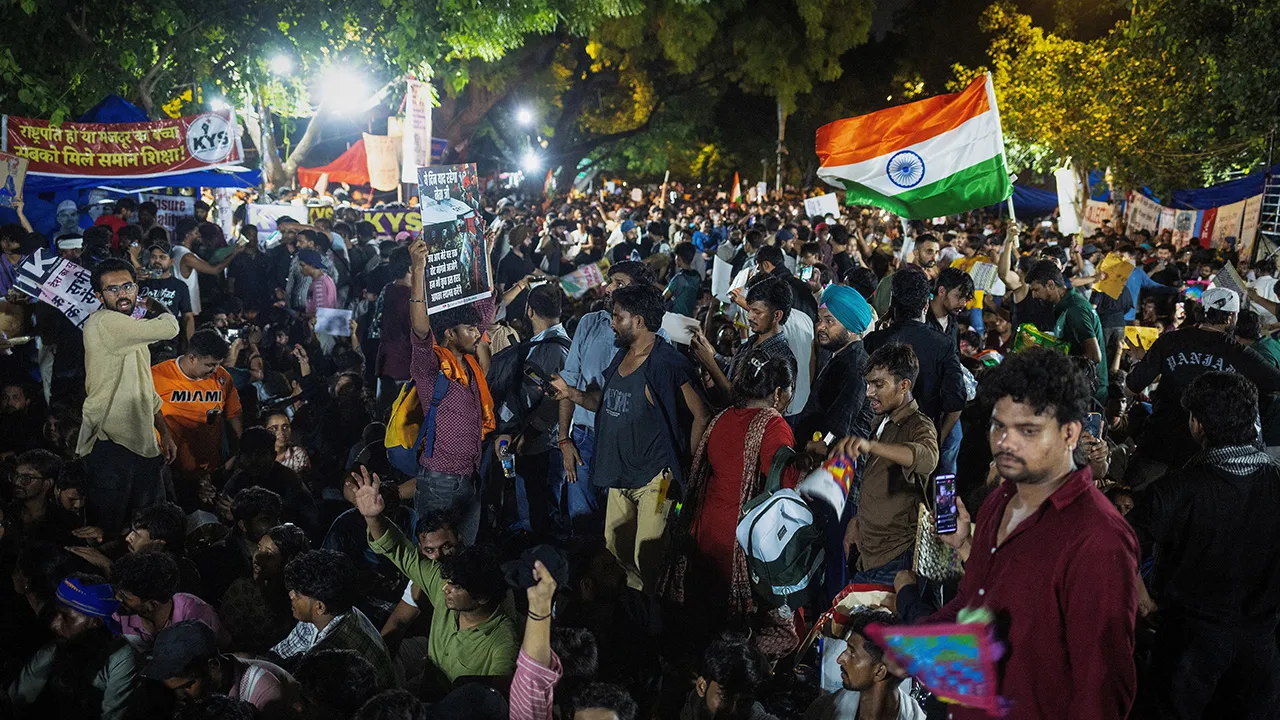 Supporters of India's Cockroach Janta Party (CJP) shout slogans at a protest site, a day after thousands of protesters marched toward parliament demanding the resignation of Education Minister Dharmendra Pradhan over examination paper leaks, at Jantar Mantar in New Delhi, India, July 21, 2026. REUTERS