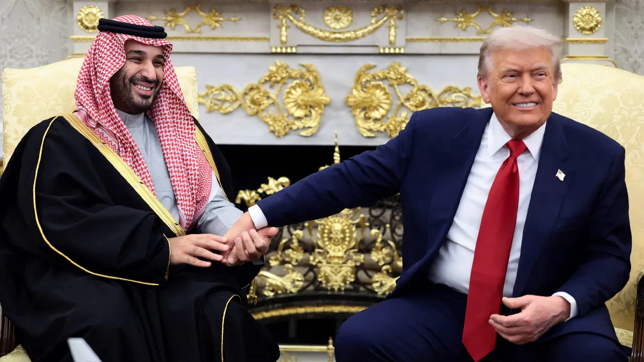 Saudi Crown Prince and Prime Minister Mohammed bin Salman holds President Donald Trump's hand during a meeting in the Oval Office, November 18. REUTERS/Evelyn Hockstein Purchase Licensing Rights