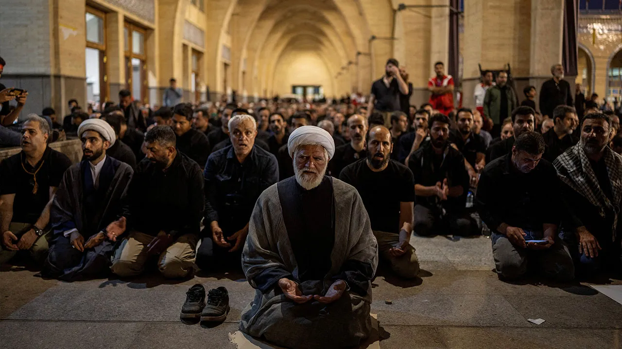 Mourners pray during a public farewell ceremony to pay their respects to late Supreme Leader Ayatollah Ali Khamenei, who was killed on February 28 in Israeli and U.S. airstrikes, at the Imam Khomeini Grand Mosalla, in Tehran, Iran July 4, 2026. REUTERS/Alkis Konstantinidis 