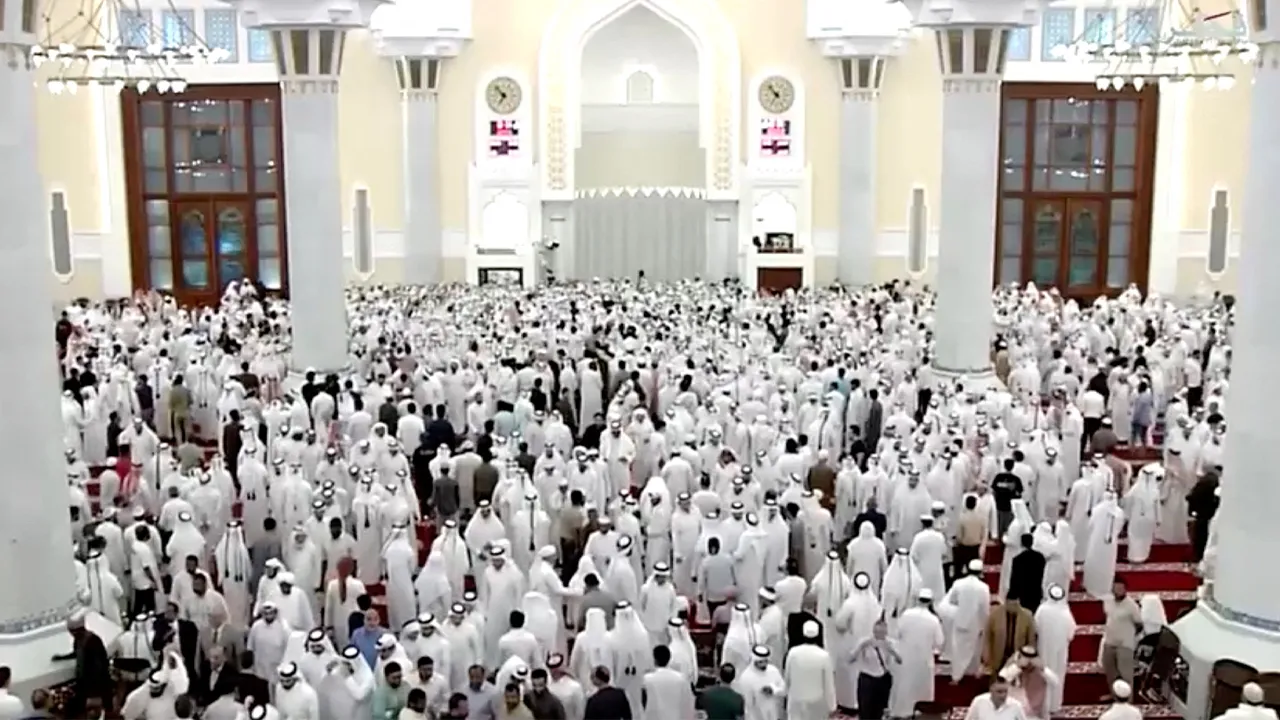 Mourners attend the funeral of former Qatari Emir Sheikh Hamad bin Khalifa Al Thani at the Imam Muhammad ibn Abd al-Wahhab Mosque, in this screengrab taken from a handout video, in Doha, Qatar, July 12, 2026. QATAR TV/Handout via REUTERS THIS IMAGE HAS BEEN SUPPLIED BY A THIRD PARTY. MUST NOT OBSCURE LOGO.