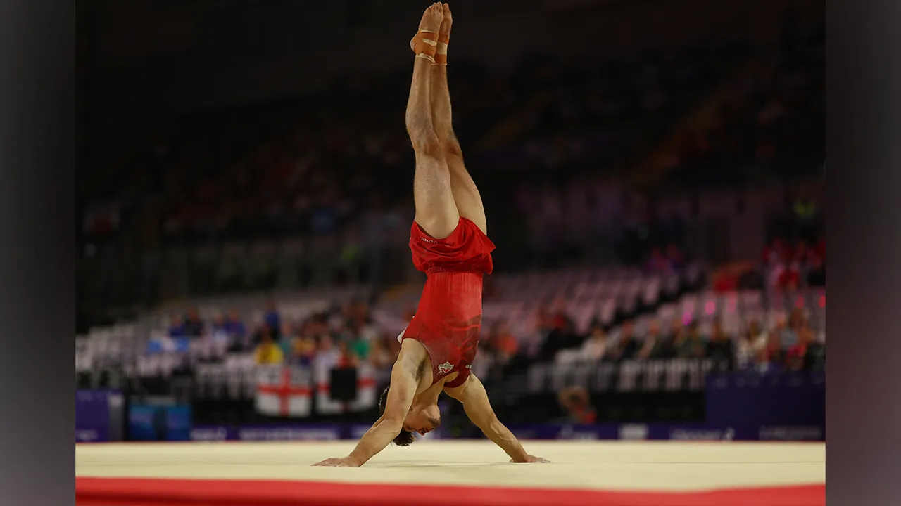 Commonwealth Games 2026 - Artistic Gymnastics - Commonwealth Arena, Glasgow, Scotland, Britain - July 24, 2026 England's Gabriel Langton in action on the floor during the Men's Team Final and Individual Qualification REUTERS/Matthew Childs