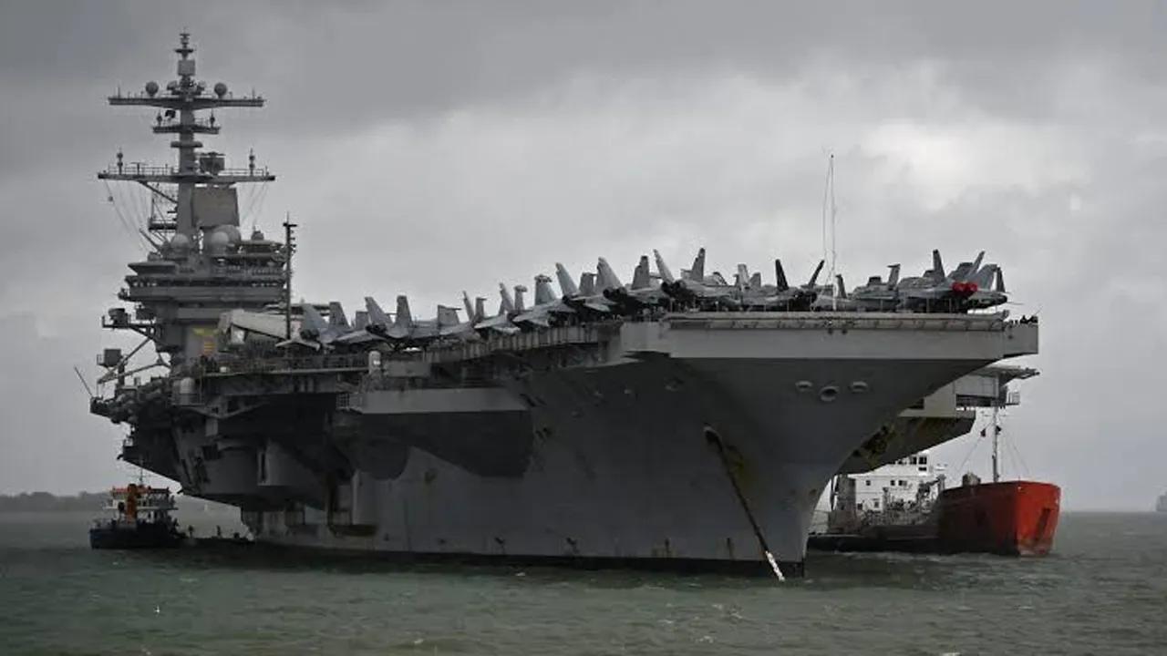 The USS George H.W. Bush aircraft carrier is seen anchored off Stokes Bay in the Solent, Britain, July 27, 2017. REUTERS/Hannah McKay/File