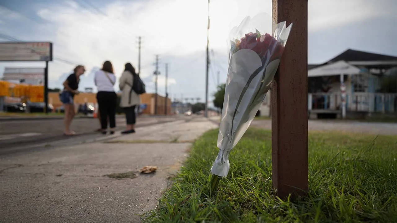 Flowers sit at the scene where an ICE agent fatally shot a Mexican motorist, identified as Lorenzo Salgado Araujo, during a vehicle stop in Houston, Texas, U.S., July 7, 2026. REUTERS/Antranik Tavitian