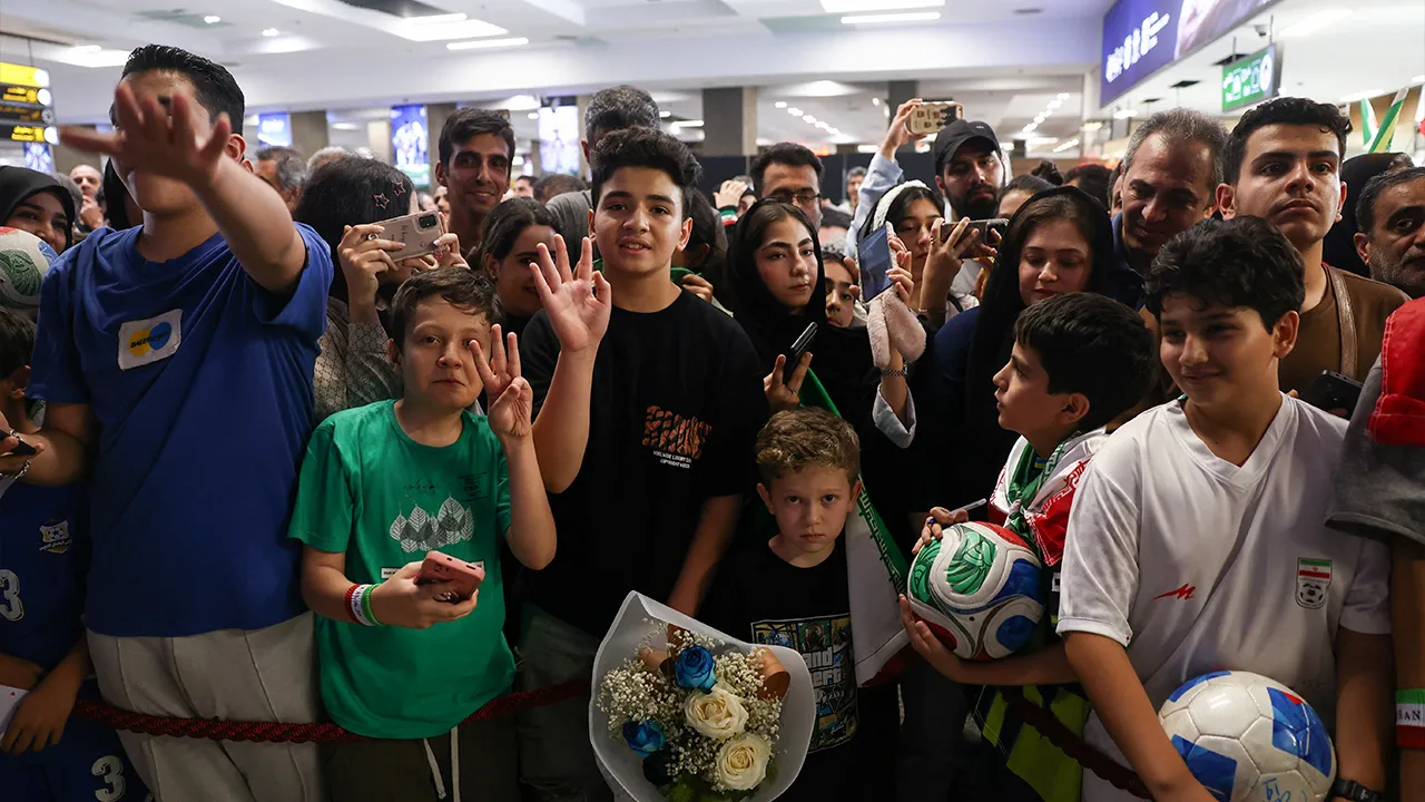 People wait for the arrival of the Iranian national soccer team at Mehrabad International Airport in Tehran, after the team's elimination from the World Cup, Iran, July 1, 2026. Majid Asgaripour/WANA (West Asia News Agency) via REUTERS ATTENTION EDITORS - THIS PICTURE WAS PROVIDED BY A THIRD PARTY. ATTENTION EDITORS - THIS PICTURE WAS PROVIDED BY A THIRD PARTY. ISRAEL OUT. NO COMMERCIAL OR EDITORIAL SALES IN ISRAEL. NO ACCESS FOR ISRAELI MEDIA. NO USE BBC PERSIAN. NO USE VOA PERSIAN. NO USE MANOTO. NO USE I