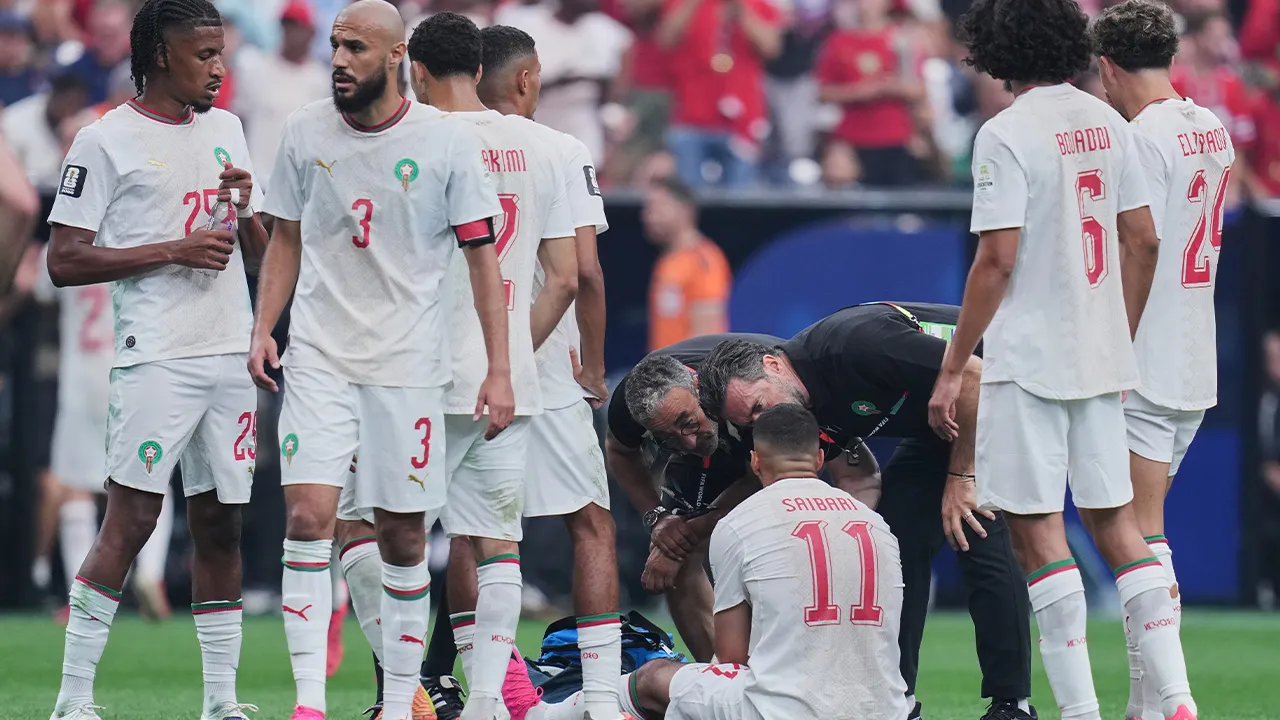 Morocco's Ismael Saibari (11) is seen on the ground as he receives medical attention from his team during the World Cup round of 16 soccer match between Canada and Morocco, in Houston, Saturday, July 4, 2026. (AP Photo/Karen Warren)