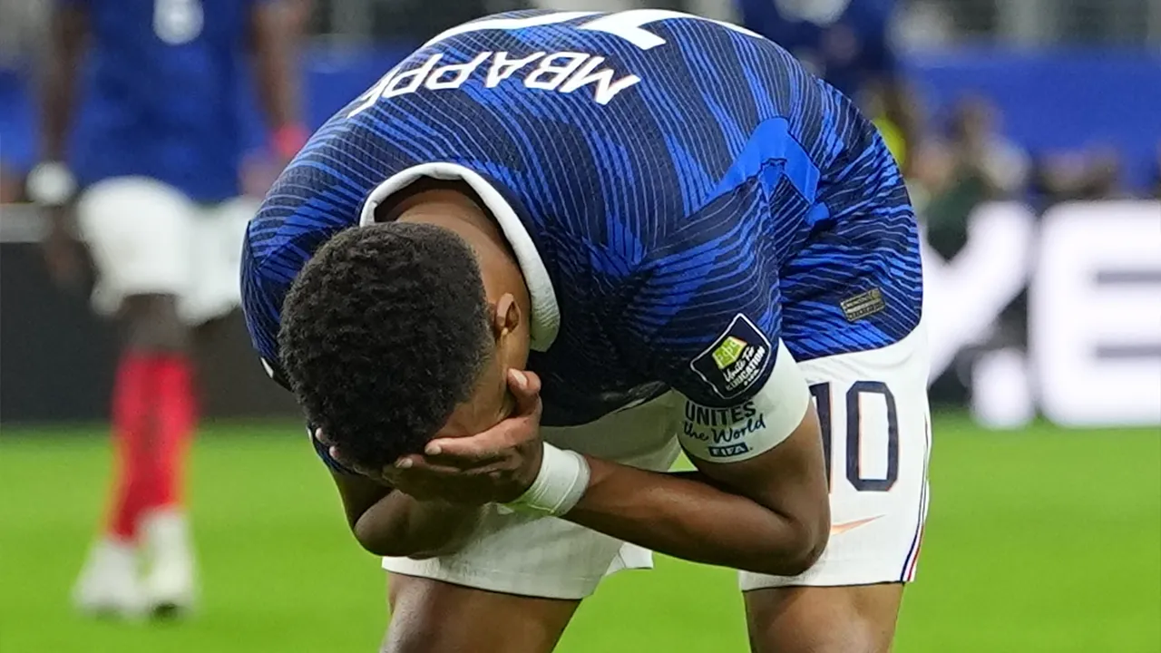 France's Kylian Mbappe reacts during a World Cup semifinal soccer match against Spain in Arlington, Texas, near Dallas, Tuesday, July 14, 2026. (AP Photo/Julio Cortez)