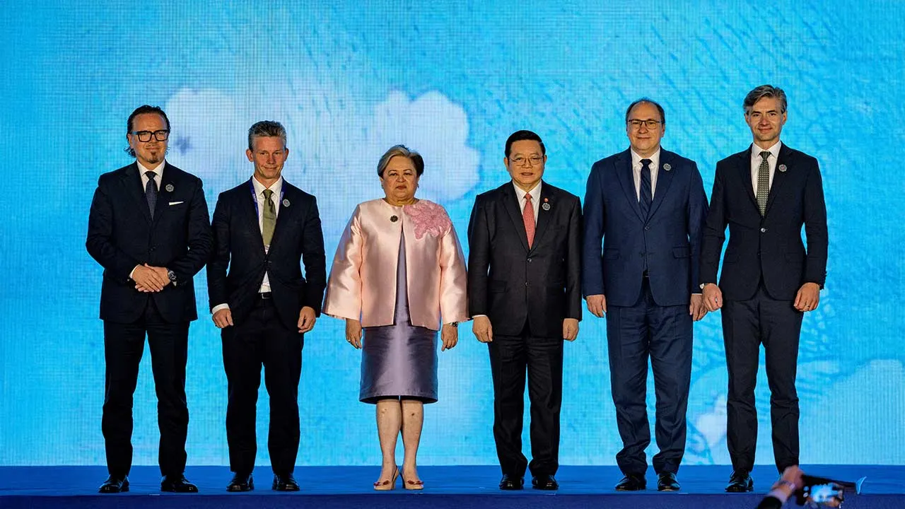 Poland Minister of State Assets Wojciech Balczun, Swedish Defense Minister Pal Jonson, Philippines Foreign Secretary Theresa Lazaro, ASEAN Secretary-General Kao Kim Hourn, Romania Minister of Education and Research Mihai Dimian, and Lithuania Foreign Minister Kestutis Budrys pose for photos during the signing ceremony for the Treaty of Amity and Cooperation in Southeast Asia (TAC), part of the ASEAN Foreign Ministers' Meeting, at the Philippine International Convention Center on July 24, 2026 in Pasay, Metr