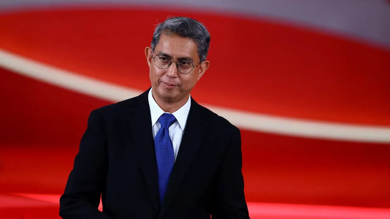 Muhammad Faishal Ibrahim is sworn in as Singapore's Acting Minister-in-charge of Muslim Affairs and Senior Minister of State for Home Affairs, during a swearing-in ceremony at the Istana, in Singapore, May 23, 2025. REUTERS/Edgar Su/Pool
