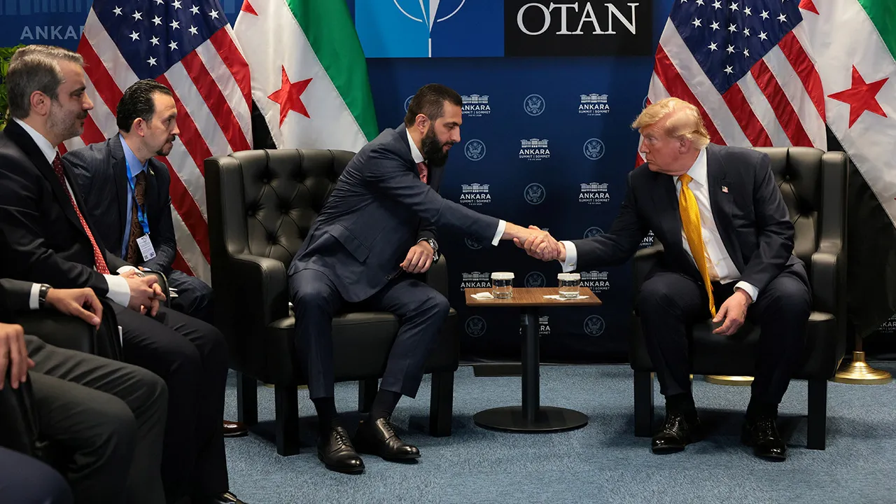 U.S. President Donald Trump shakes hands with Syrian President Ahmed al-Sharaa during a bilateral meeting alongside the NATO leaders summit at the Bestepe Presidential Compound in Ankara, Turkey, July 8, 2026. REUTERS/Jonathan Ernst