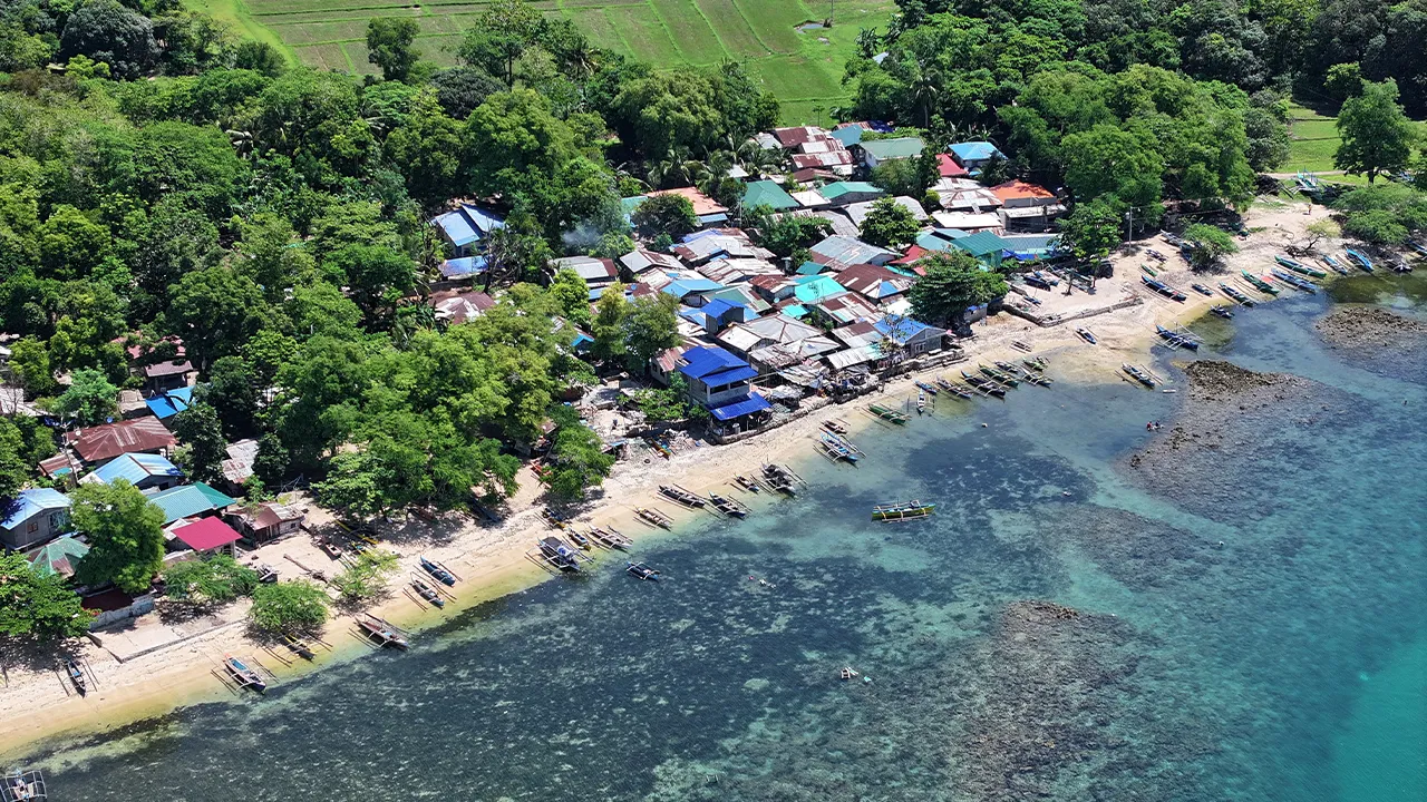 A drone view shows fishing vessels docked in San Salvador, Masinloc, Zambales province, Philippines, July 8, 2026. As the Philippines marks the 10th anniversary of the July 12, 2016, international arbitral ruling that invalidated China's expansive claims in the South China Sea. REUTERS/Adrian Portugal