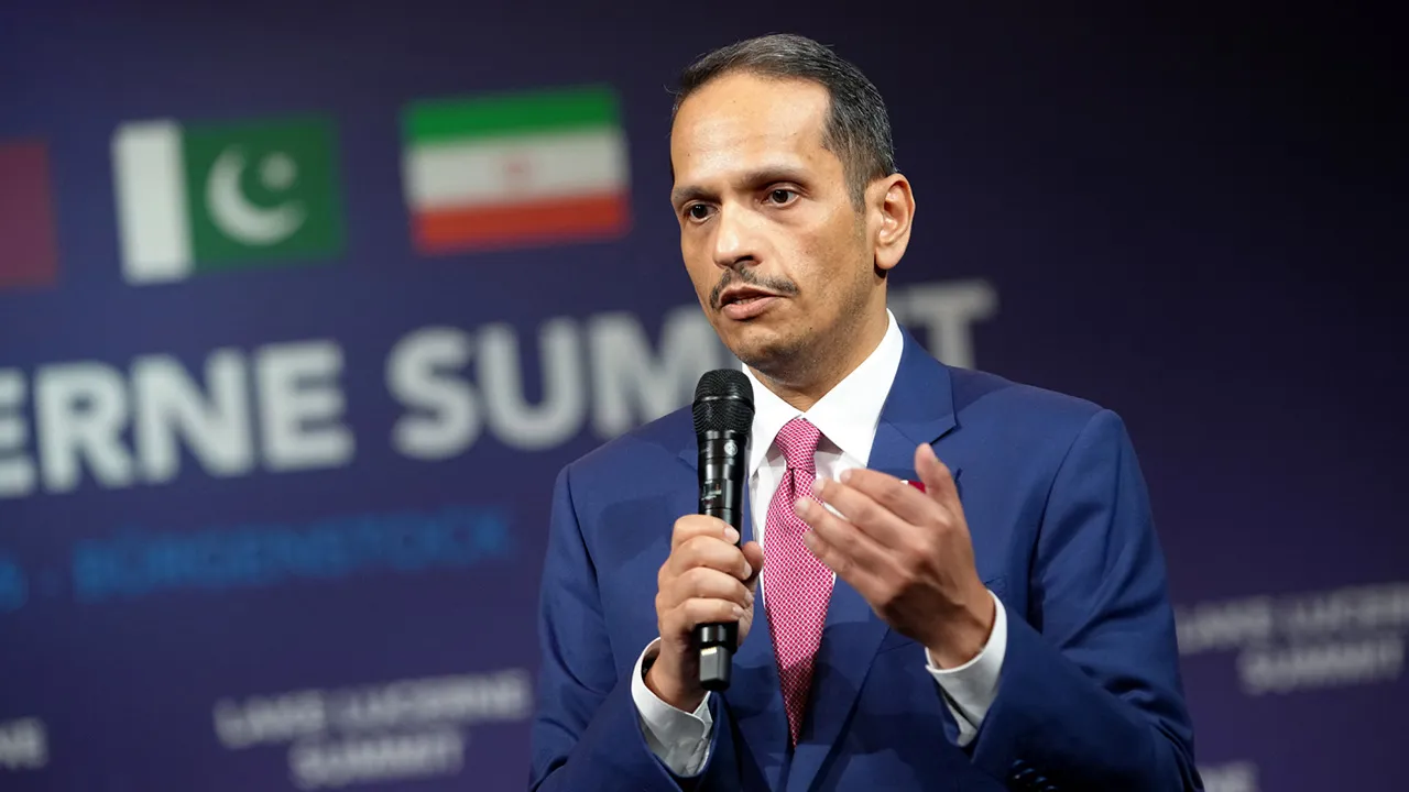 Qatar's Prime Minister and Minister for Foreign Affairs Sheikh Mohammed bin Abdulrahman bin Jassim Al-Thani makes an opening statement at the start of a quadrilateral meeting between the U.S., Iran, Pakistan, and Qatar, at the Bürgenstock Resort in Obbuergen, Switzerland, Sunday, June 21, 2026. (Nathan Howard/Pool Photo via AP)